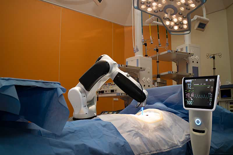 The Mako Robotic Arm System being used in an operating room.